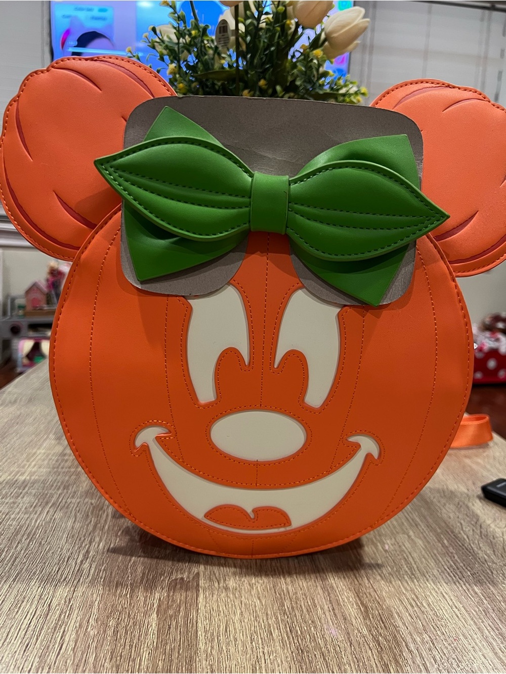 Loungefly Orange Pumpkin Minnie Ear Backpack with Green Bow
